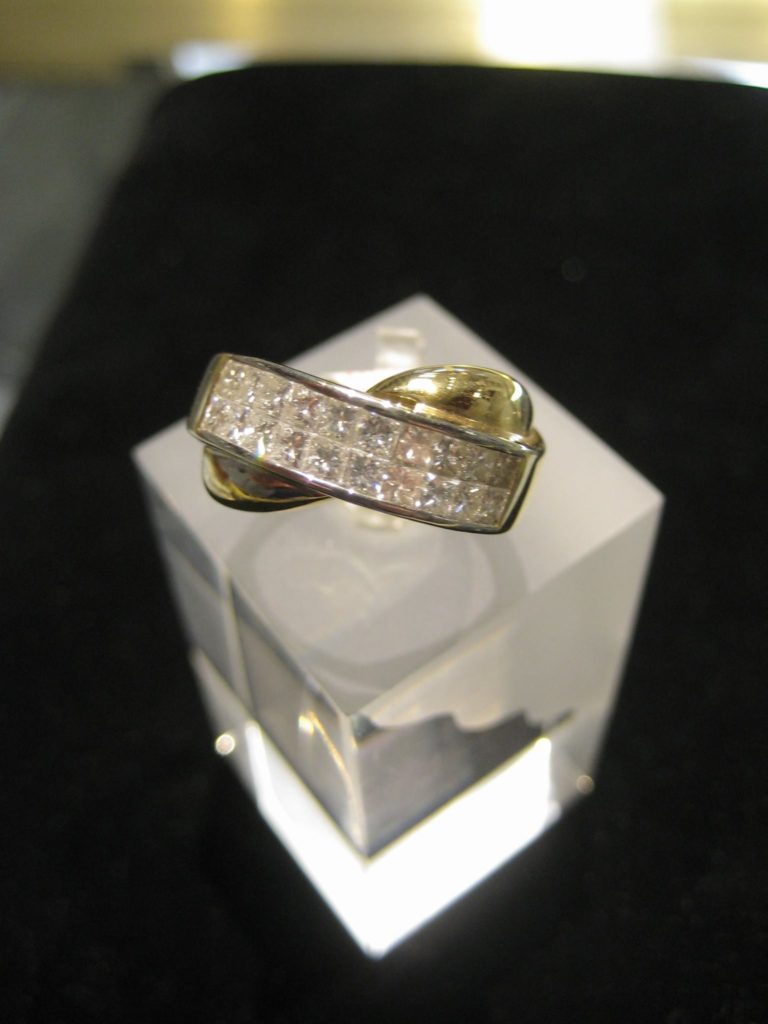 infinity ish ring with invisible set diamonds